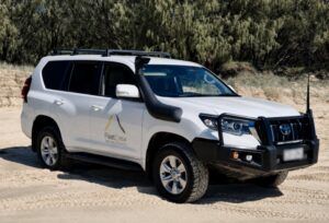 FleetCrew Toyota LandCruiser Prado 150 Hire Vehicle on the beach