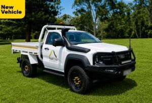 Mine Spec Ford Ranger Super Duty Single Cab in a green field
