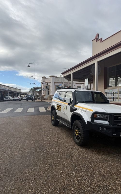 White FleetCrew Prado parked on the side of the street in Gulgong, New South Wales